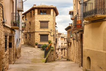Selbstklebende Fototapeten Enge Straßen Fork of narrow streets with old stone houses in the town of La Fresneda, Teruel.  © josemiguelsangar