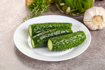Homemade lighty salted cucumbers with herbs