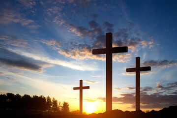Good Friday. Friday before Easter. Christian crosses against the sunset