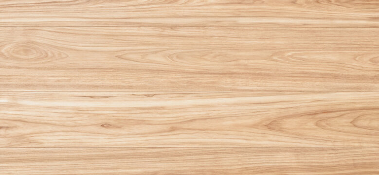 Light brown wood grain texture shows horizontal pattern. Close up photo of clear wood texture for background and wallpaper.
