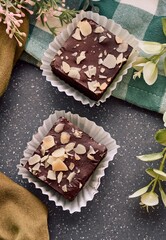 A delicious close-up of two homemade chocolate brownies