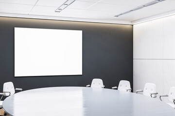 Modern corporate meeting room interior with round table and blank poster frame on dark wall for mockup presentation layout design concept. 3D Rendering