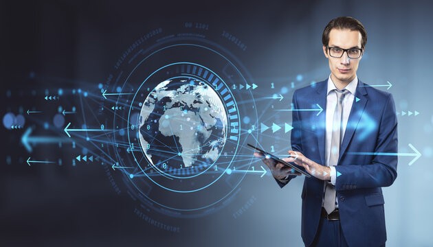 Businessman in blue suit using tablet with digital world map and data flow symbols on futuristic light background representing global technology concept. - Powered by Adobe