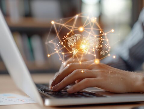 Hands typing on laptop with digital network connections and globe representation in a modern workspace setting