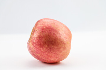 Apple with visible bumps and dimpled surface