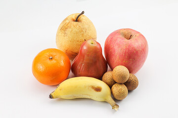 Group of fruits on white surface with variety