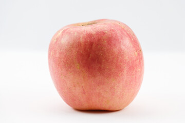  Plump apple with shiny red and yellow skin