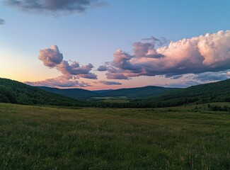 Obraz premium A beautiful view of the mountains and vast grassy plains