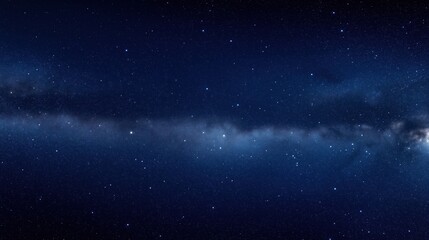 Obraz premium A breathtaking view of a starry night sky with a galaxy visible in the background.