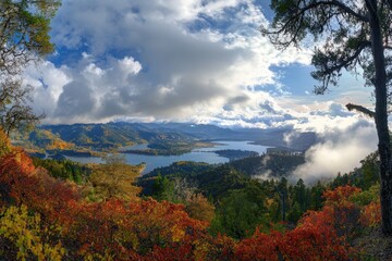 Fototapeta premium Breathtaking Autumn Vista of Howell Mountain in Napa Valley Wine Region with Lush Vineyards, Majestic Mountains, and Serene Lake Under the Cloudy Sky