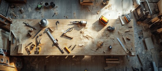 Woodworking tools scattered on workshop bench