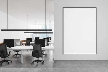 Modern office interior with large framed blank poster on wall. 3D Rendering