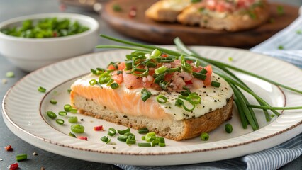 Delicious open-faced bread topped with fresh chives and salmon paired with vibrant tomato salsa