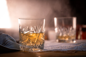 Close-up of whiskey in a crystal glass set against a dark, moody background—evoking elegance, sophistication, and premium lifestyle. Perfect for alcohol brands, bar ads, and luxury lifestyle content.