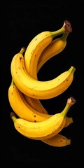 bunch of bananas on black background