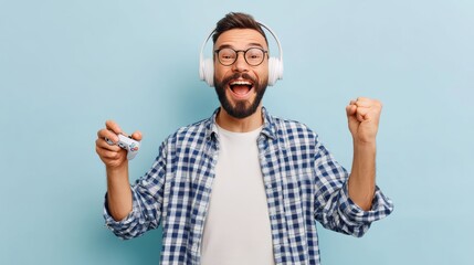Fototapeta premium With headphones on and a joystick, a joyful man is playing with headphones --chaos 25 --ar 16:9 --profile muwoyfp --v 7 Job ID: 8de3e80c-5f80-4daa-99bb-387f45c0e824