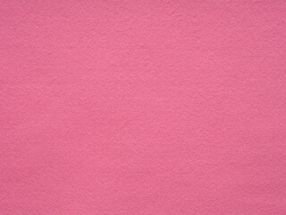 Lush fuchsia felt surface, embodying a mix of playful sophistication and vibrant visual texture