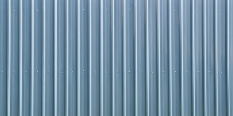 Obraz premium Metal roof grey corrugated iron sheet aluminium teal steel background wall panel tile construction siding building line pattern texture seamless architecture plate frame for presentation product.