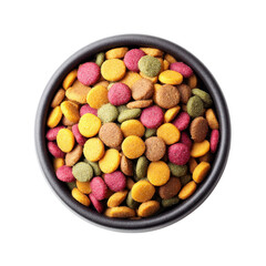 Dry pet food in a bowl. Colorful kibble for cats or dogs. Top view.