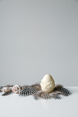 A collection of easter table decoration eggs celebrating a Happy Easter with copy space. Spa concept. Relax time.