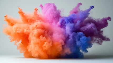 Fototapeta premium Colorful powder explosion against a plain background