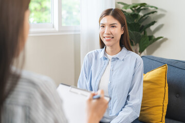 Psychology concept, depression. Happy smile asian young woman patient mental therapy explain...