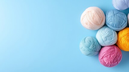 Yarn Balls Colorful Skeins Pastel Style High-resolution Photography Top-down Arrangement Soft Textures Crafting Hobby Blue Background Bright Cheerful Mood Ideal for Craft Blogs