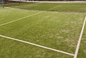 Obraz premium Part of the synthetic grass tennis court with markup