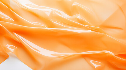 Obraz premium Abstract texture crumpled orange plastic cellophane surface material Orange Plastic background, Texture, macro, background