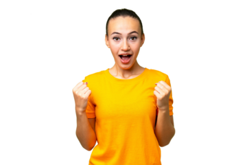 Young Arab woman over isolated background celebrating a victory in winner position