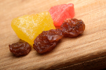 Colorful candies displayed on a wooden surface