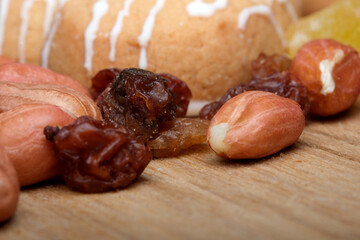 Nuts and dried fruits arranged on a wooden table