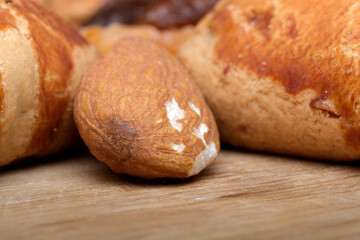 Nutty baked treats on wood