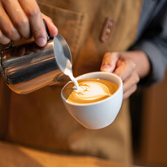  Barista pouring latte art