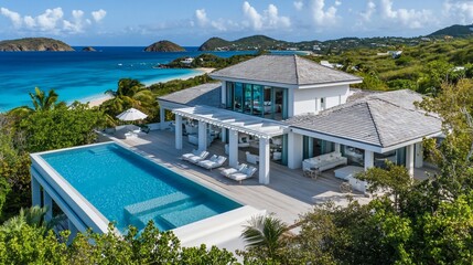 Exclusive coastal home featuring luxury pool overlooking pristine beach waters