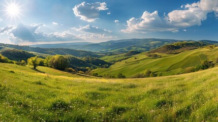 Panorama of rolling hills and grassy meadows in rural romanian mountains