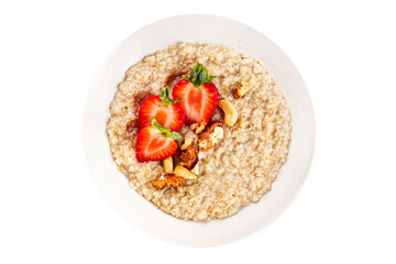 Oatmeal porridge strawberrie nuts healthy breakfast appetizer dish fresh gourmet food background on the table rustic food top view copy space 