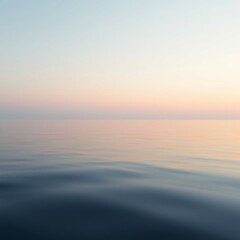 Fototapeta premium Calm Ocean Water Reflecting Peaceful Pastel Sky at Twilight Hour