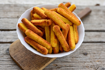 Mozzarella sticks Italian cheese breaded  oven baked  mozzarella sticks with   burger sauce ..Italian street food.