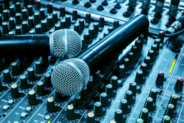 Microphone on the audio mixer in the audio control room.