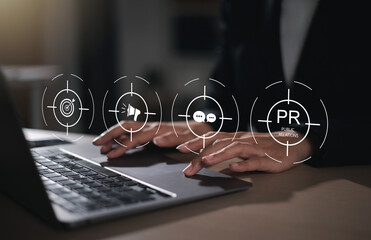 Businessman using laptop with public relations on virtual screen for marketing strategy, public...