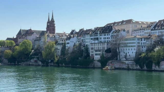 Basel, Switzerland - Basel historic center with view of the Rhein river and Basler M&uuml;nster cathedral, Reformed Protestant church, located at Basel M&uuml;nsterplatz square, Rhine river