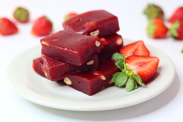 Strawberry halwa, a smooth Indian dessert with a rich pink hue