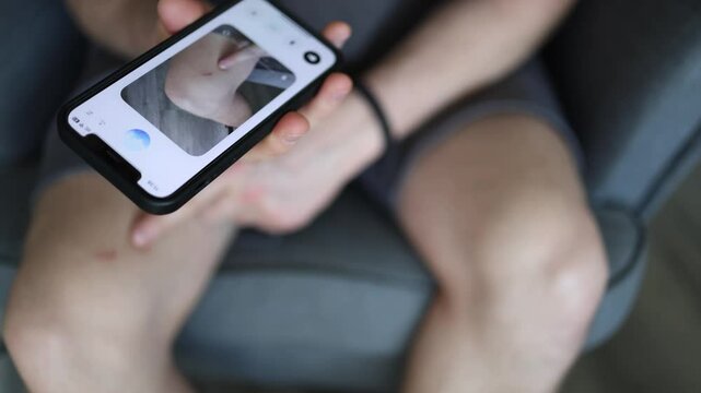 Exploring massage gun with ChatGPT no manual needed just show and learn user holds device to camera AI guides through steps relaxed setup blends curiosity with real-time smart help
