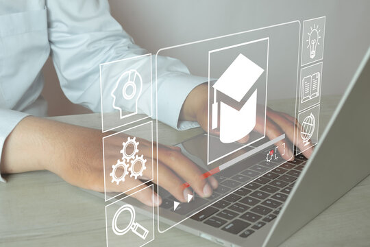 Digital learning and education concept with laptop showing icons for education, study, gears, and global knowledge. E-learning, virtual classroom, and technology in education.