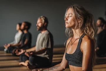 A diverse group of people doing a breathwork exercise in a mindfulness and meditation retreat © Dennis