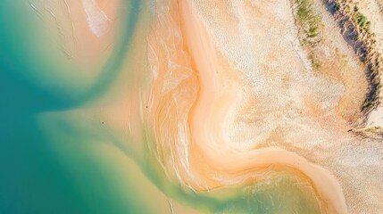 Fototapeta premium Aerial View of Serene Coastal Landscape with Mixed Sandy and Turquoise Waters