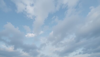 Obraz premium Serene Sky A Collection of Soft, Pastel Clouds Drifting Across a Calm Blue Sky