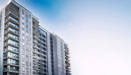 Obraz premium business banner with a new multi storey building light background with space for text advertising for real estate agencies developers