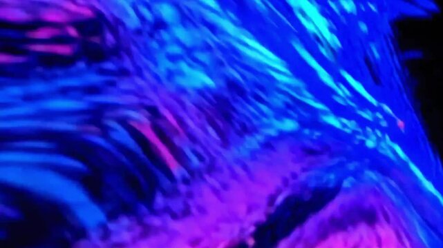 Cinematic 4K footage of vibrant abstract shapes and colors morphing on a high-res screen, featuring smooth transitions, digital aesthetics, and dynamic motion visuals.